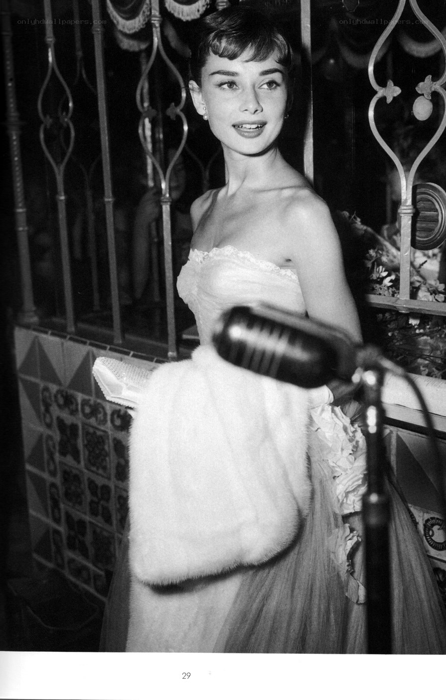 Audrey Hepburn at microphone