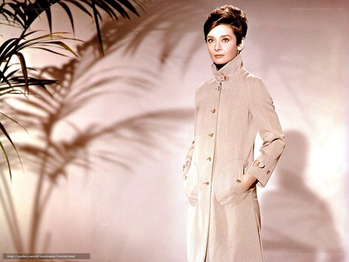 Audrey Hepburn in a beige coat