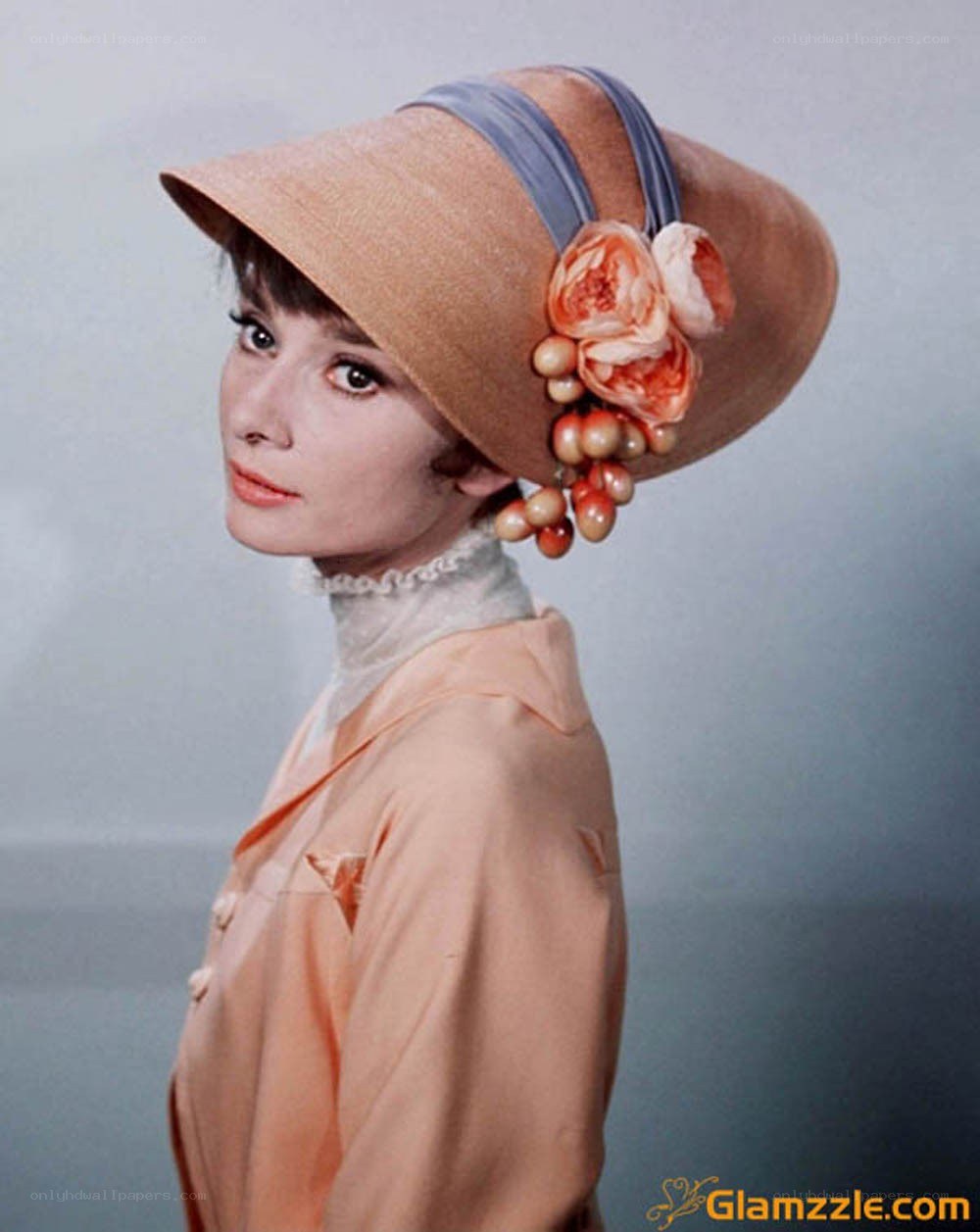 Audrey Hepburn in a peach hat