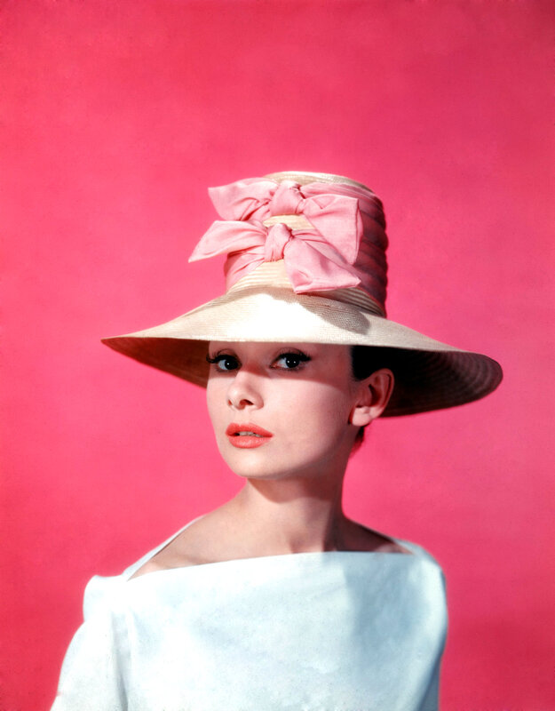 Audrey Hepburn in a pink hat