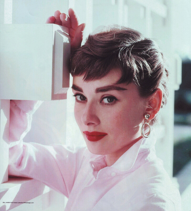Audrey Hepburn in a pink shirt