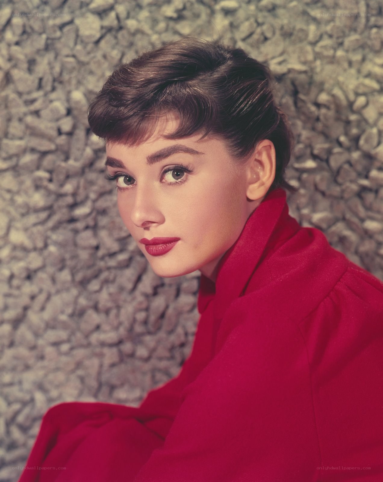 Audrey Hepburn in a red coat