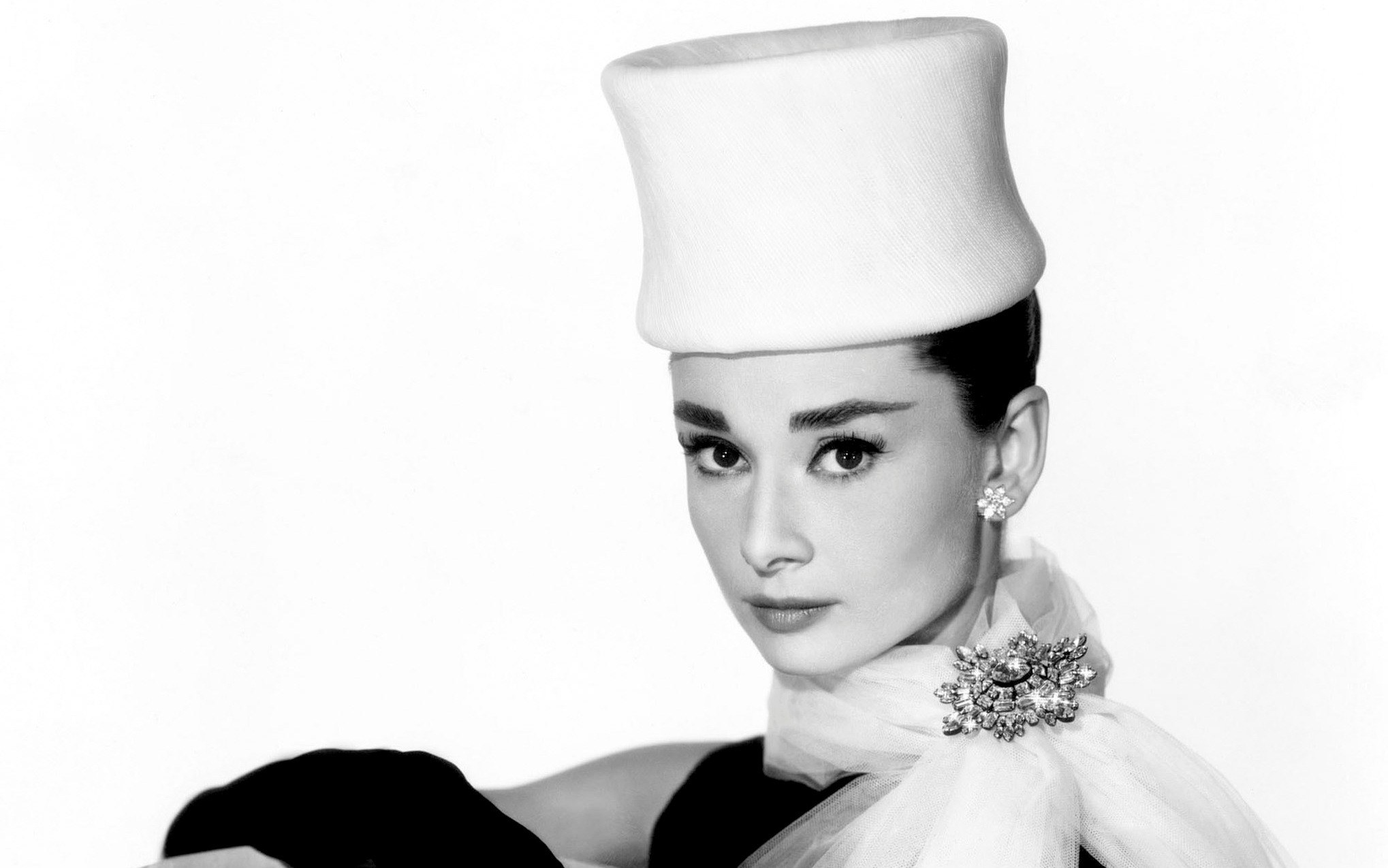 Audrey Hepburn in a white hat