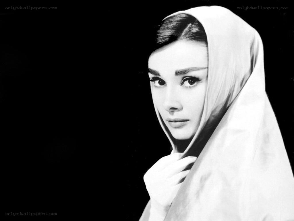 Audrey Hepburn in a white headscarf