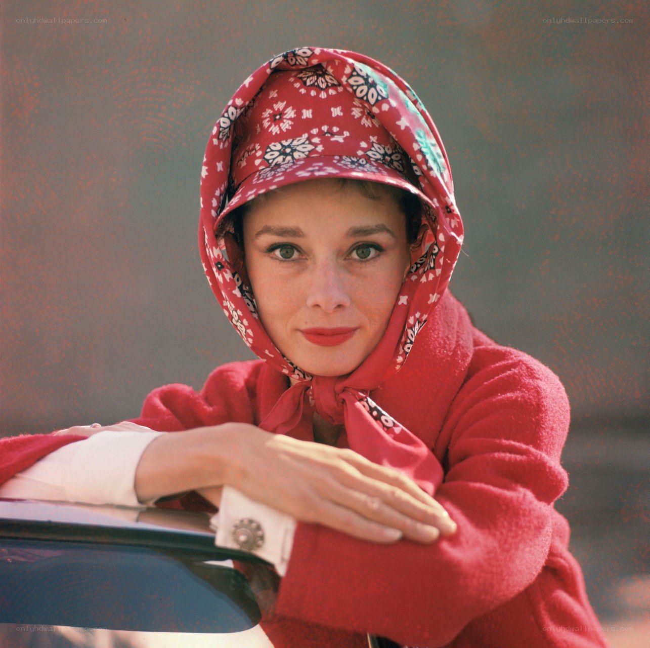 Audrey Hepburn in red coat