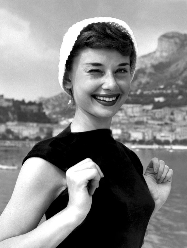 Audrey Hepburn smiling by the sea