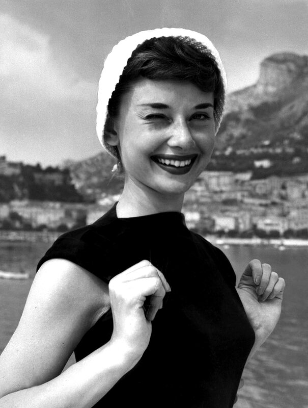 Audrey Hepburn smiling by the sea