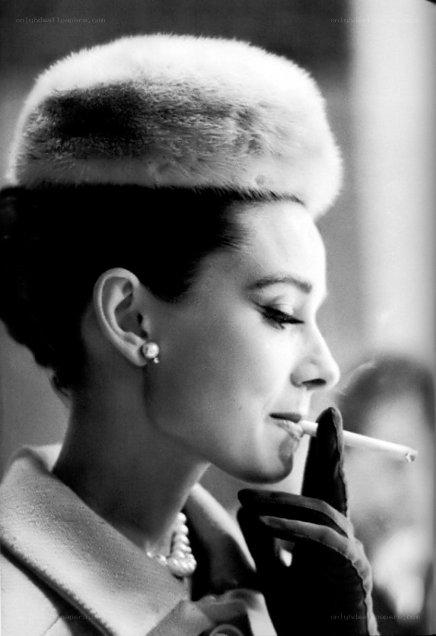 Audrey Hepburn smoking a cigarette
