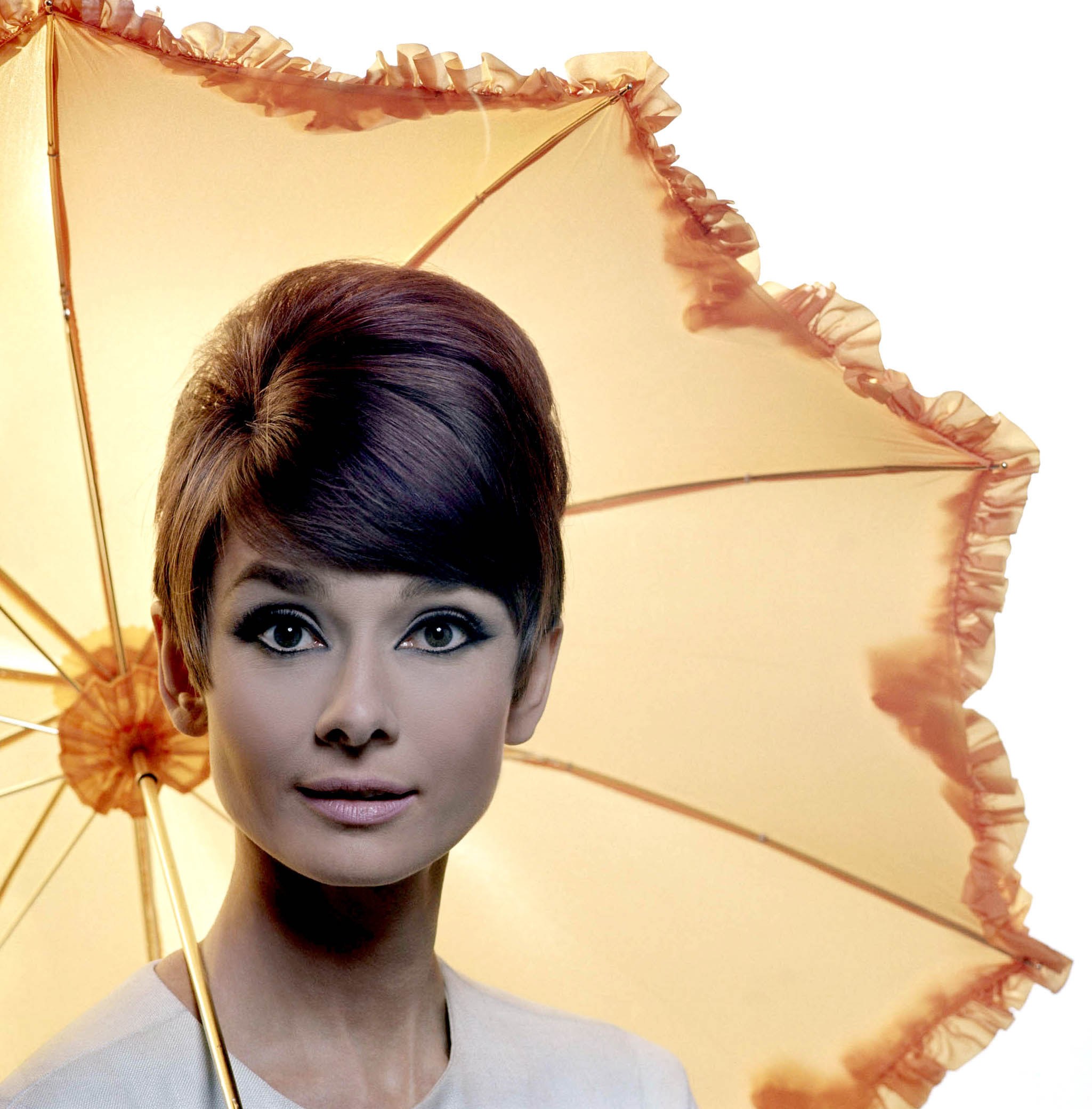 Audrey Hepburn with a parasol