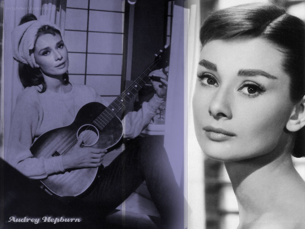 Audrey Hepburn with guitar