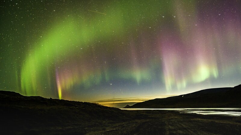 Aurora Borealis Display — Green, Serene, Night, Photograph, Stars, Mountains