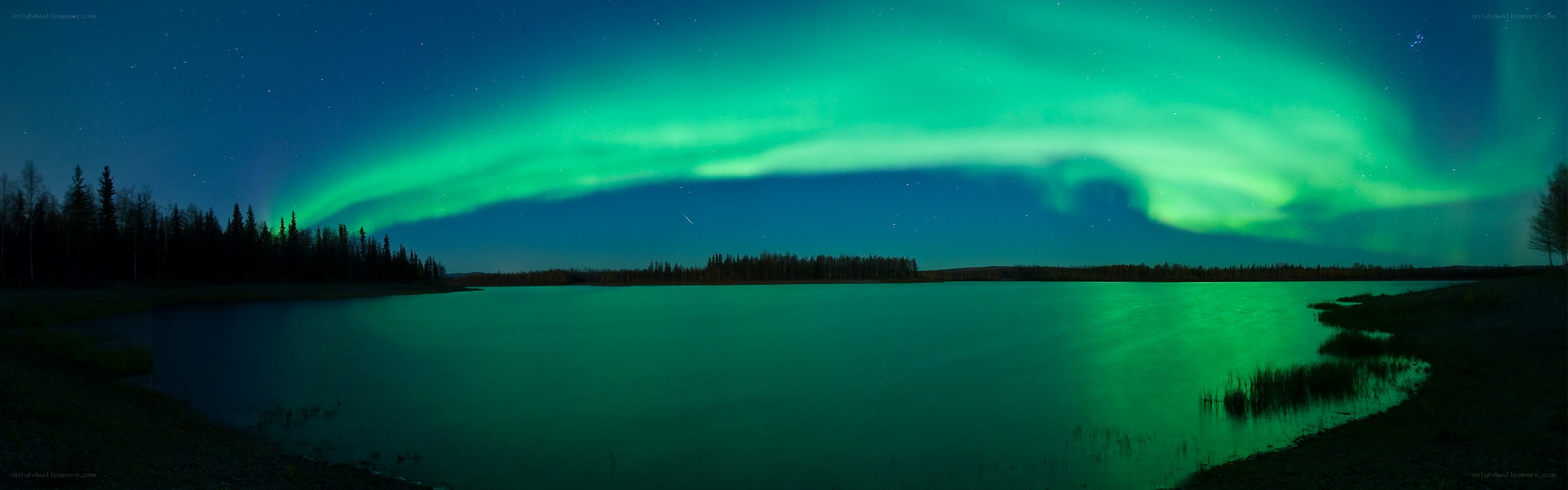 Aurora borealis over a lake