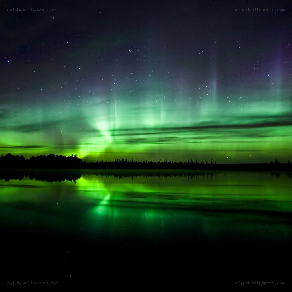 Aurora borealis over a lake