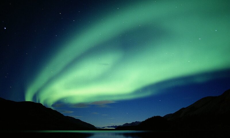 Aurora borealis over a lake
