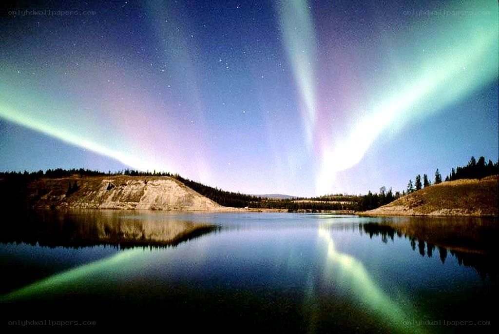Aurora borealis over a lake