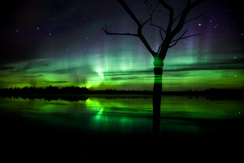 Aurora borealis over a lake