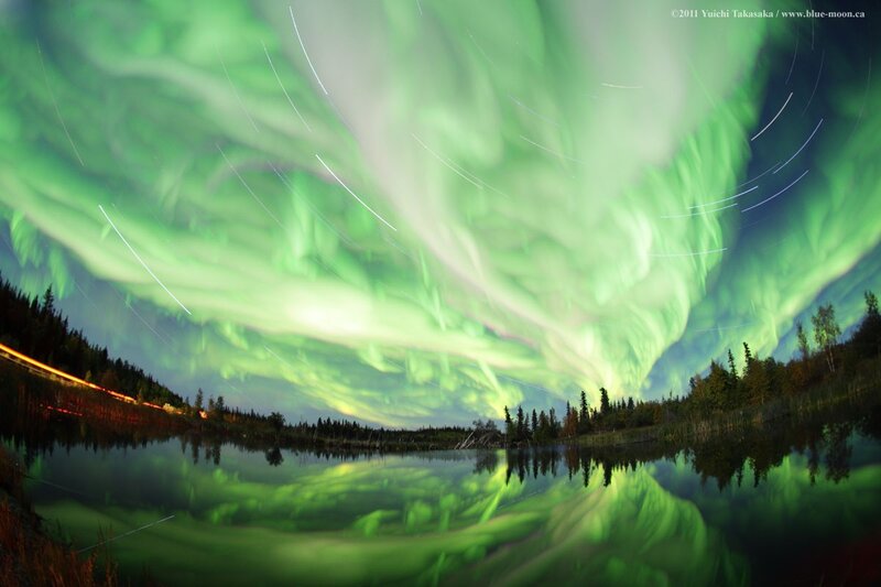 Aurora borealis over a lake