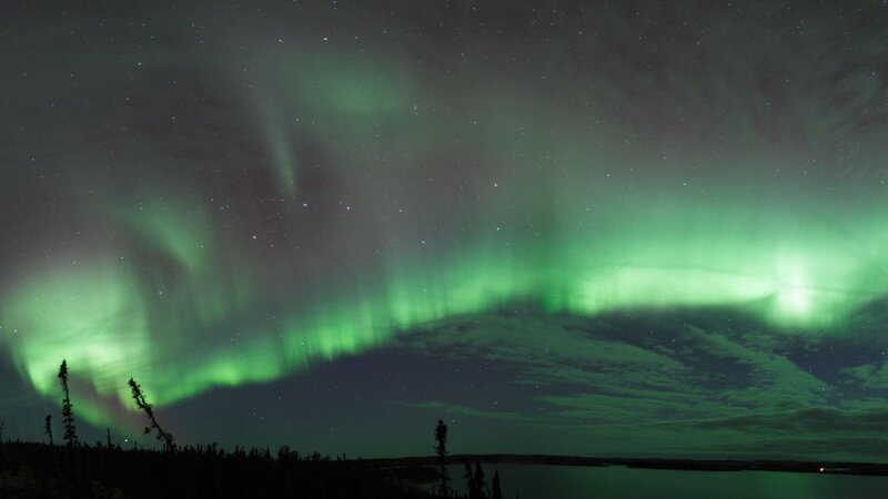 Aurora borealis over a lake