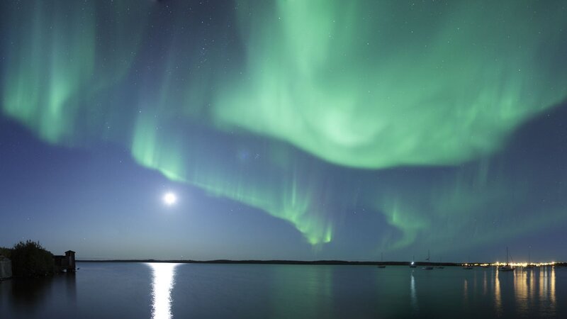 Aurora borealis over a lake