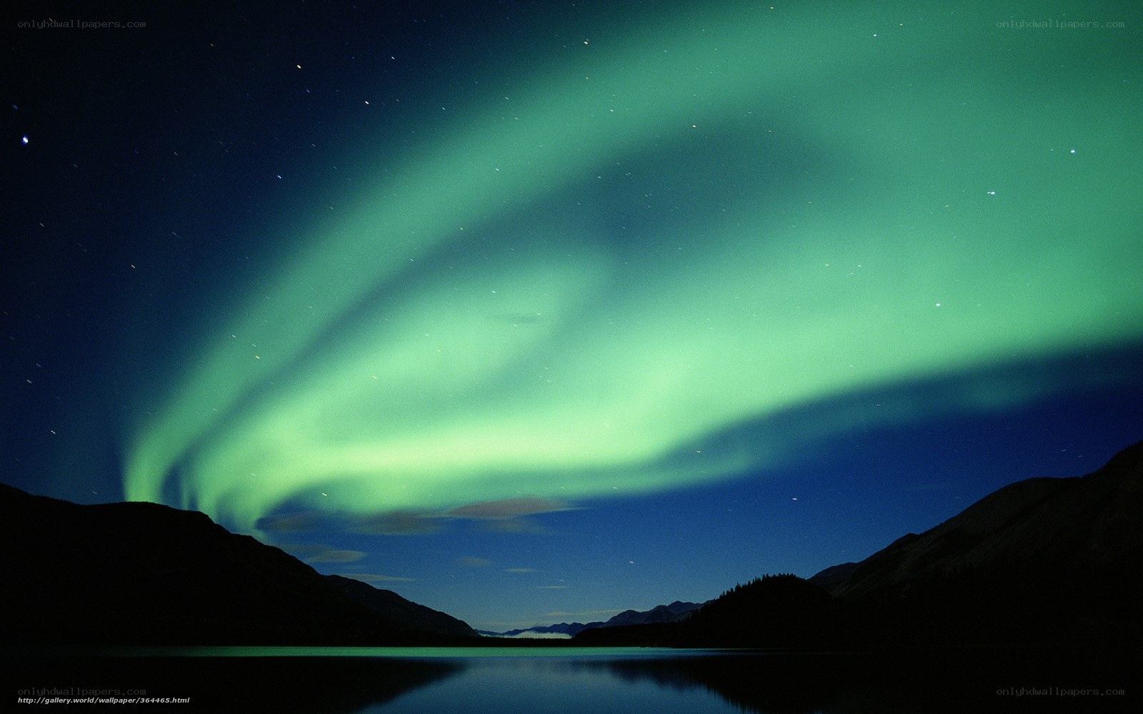 Aurora borealis over a lake