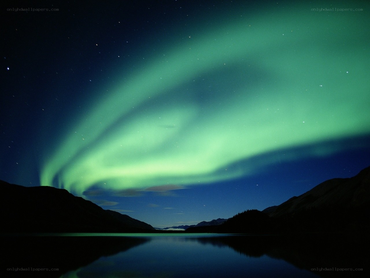 Aurora borealis over a lake