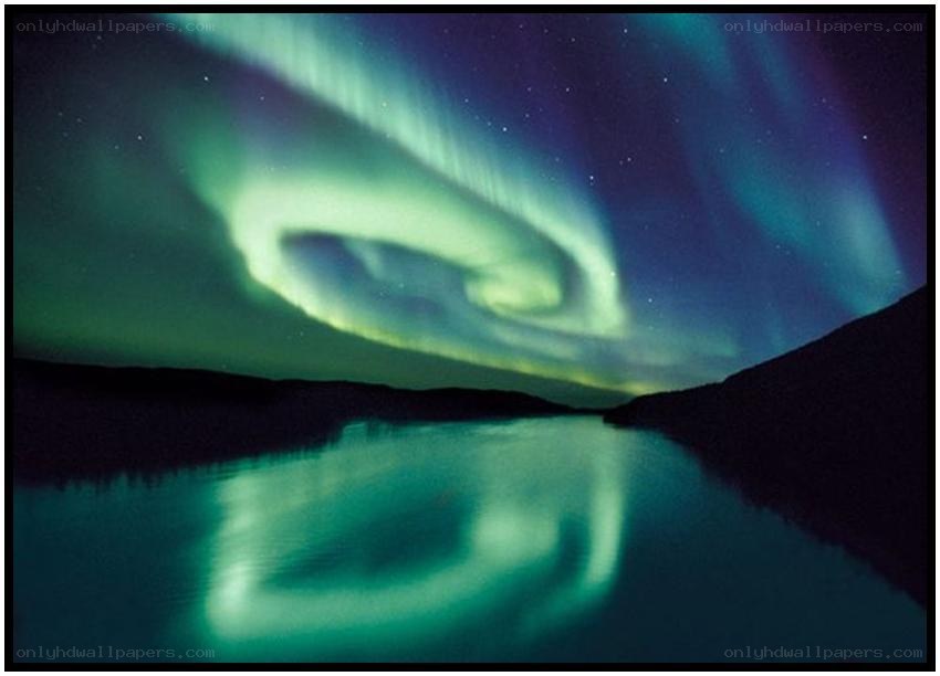 Aurora borealis over a lake