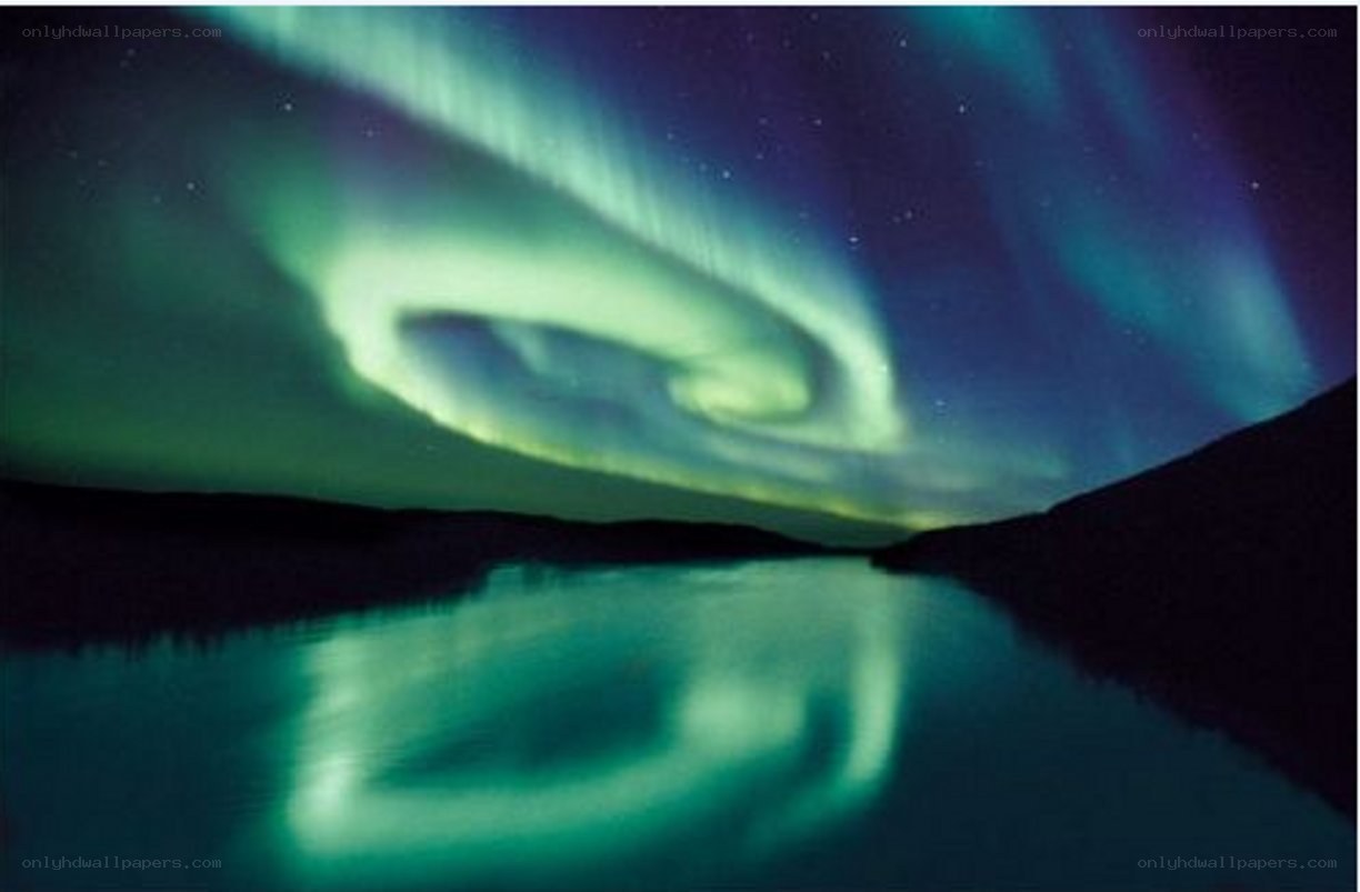 Aurora borealis over a lake