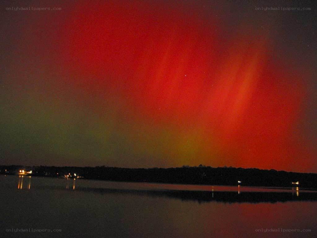 Aurora borealis over a lake