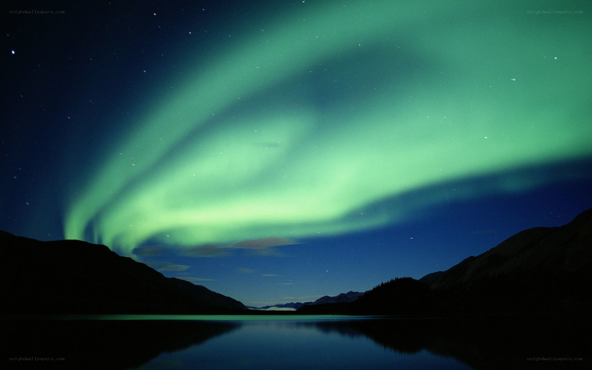 Aurora borealis over a lake