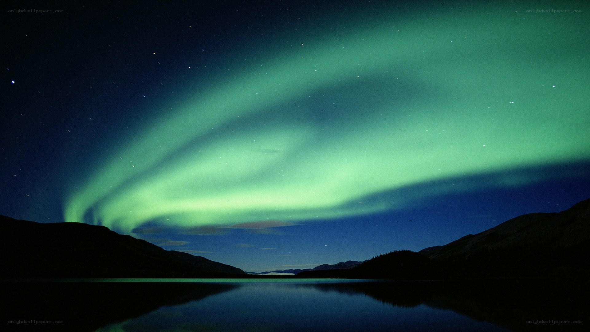 Aurora borealis over a lake