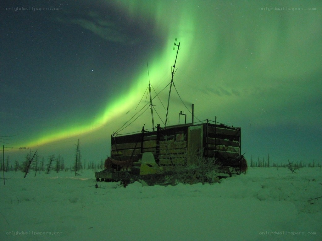 Aurora borealis over a research station