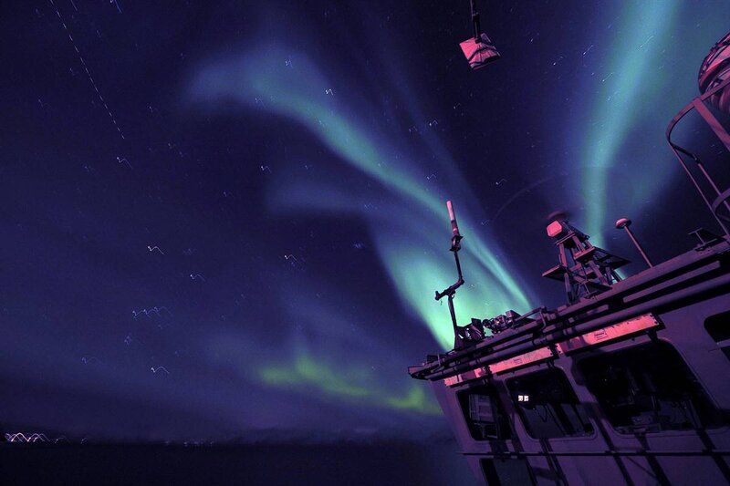Aurora borealis over a ship