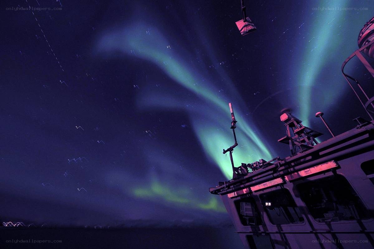 Aurora borealis over a ship
