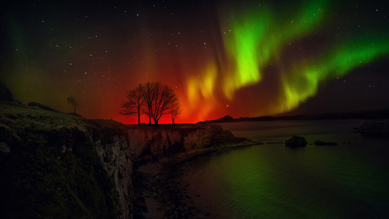 Aurora Borealis over Cliffs