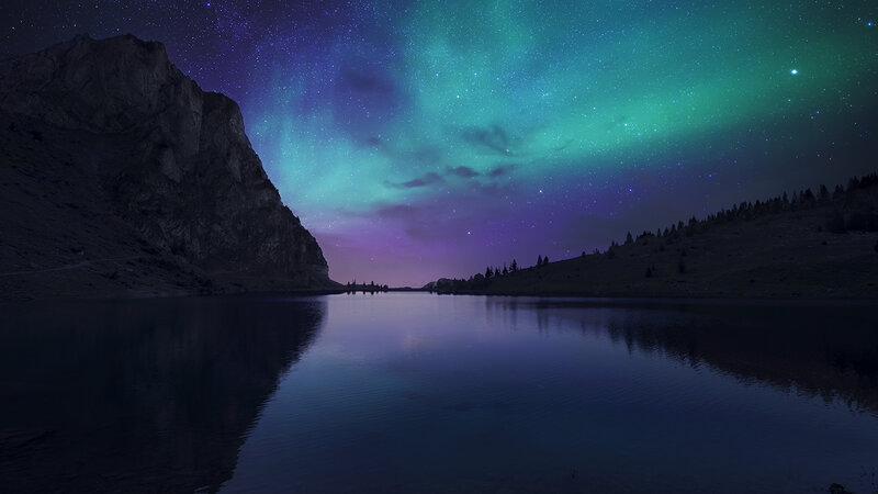 Aurora Borealis over Lake — Green, Serene, Night, Photograph, Mountain, Stars