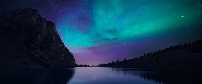 Aurora Borealis over Lake — Green, Serene, Night, Photograph, Mountain, Trees
