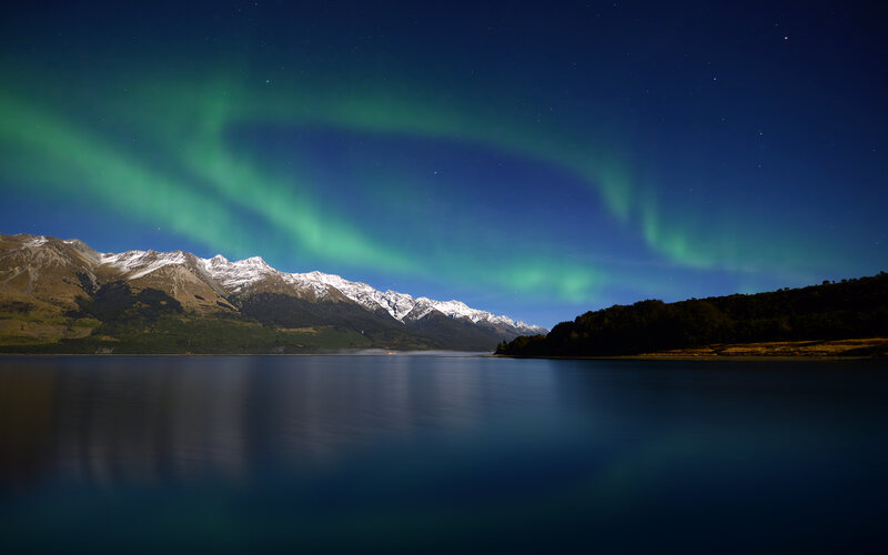 Aurora Borealis over Lake — Green, Serene, Night, Photograph, Mountains, Forest