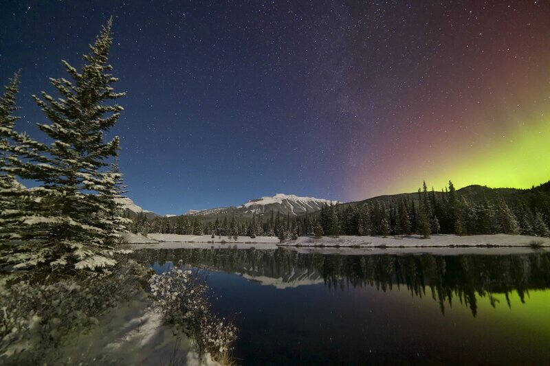 Aurora Borealis over Lake — Green, Serene, Night, Photograph, Mountains, Trees, Reflection