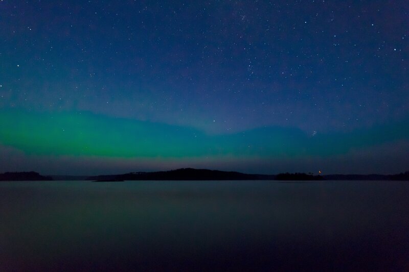 Aurora Borealis over Lake — Green, Serene, Night, Photograph, Stars, Moon