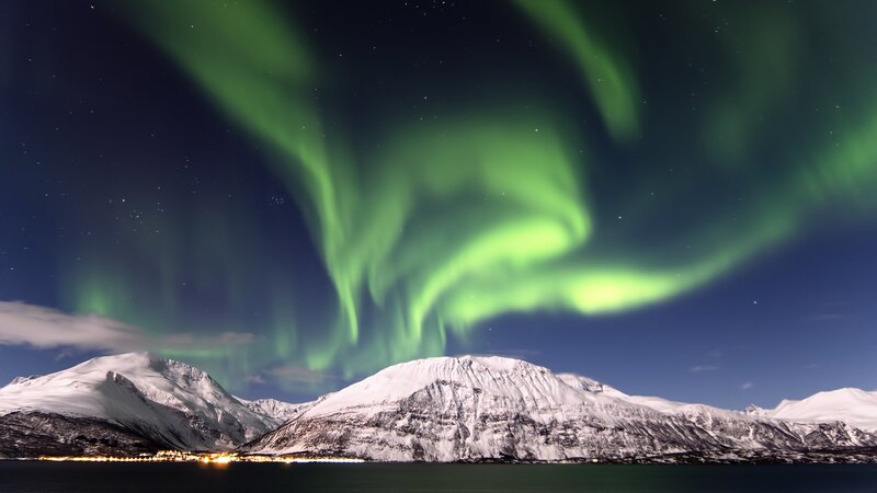 Aurora Borealis over Mountains — Green, Dramatic, Night, Photograph, Snow, City Lights