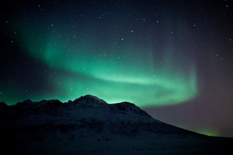 Aurora Borealis over Mountains — Green, Serene, Night, Photograph, Stars