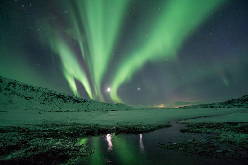 Aurora Borealis over Snow — Green, Serene, Night, Photograph, Mountains, Stars