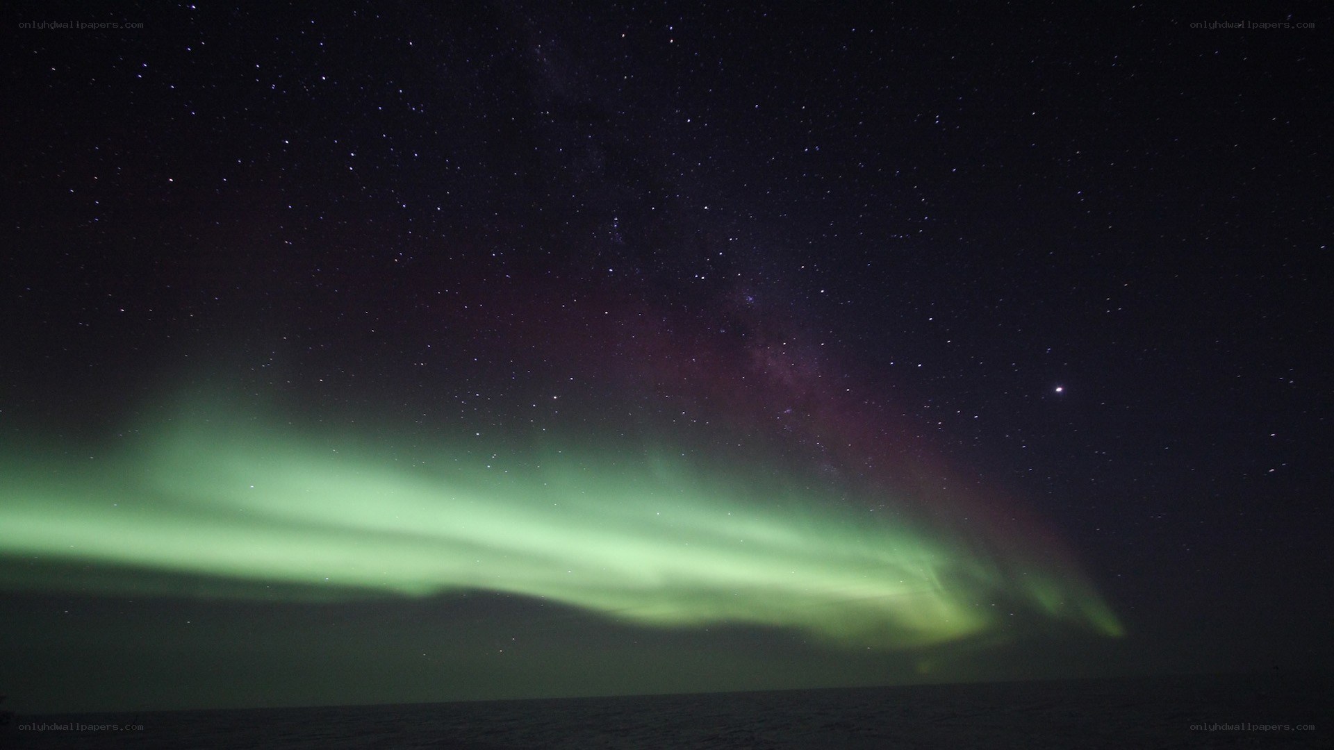 Aurora borealis over the sea