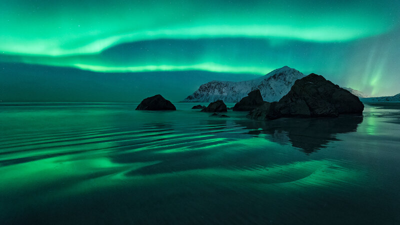 Aurora Borealis over Water — Green, Serene, Night, Photograph, Mountain