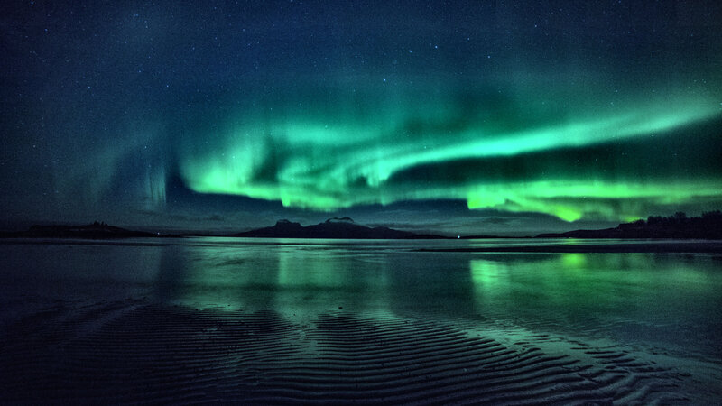 Aurora Borealis over Water — Green, Serene, Night, Photograph, Mountains, Stars, Reflection
