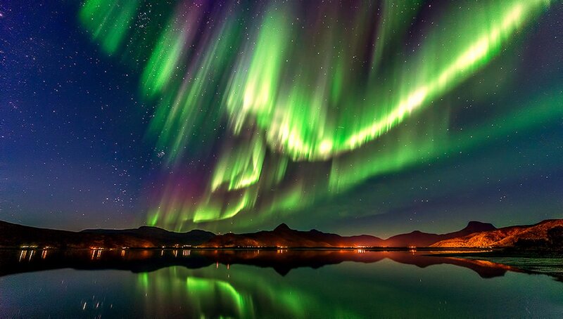 Aurora Borealis over Water — Green, Serene, Night, Photograph, Mountains, Stars