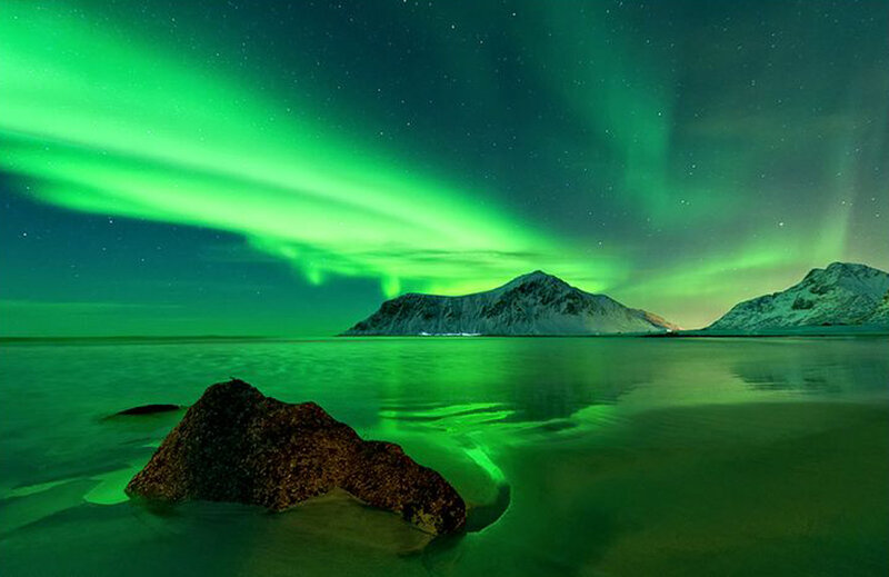 Aurora Borealis over Water — Green, Serene, Night, Photograph, Mountains