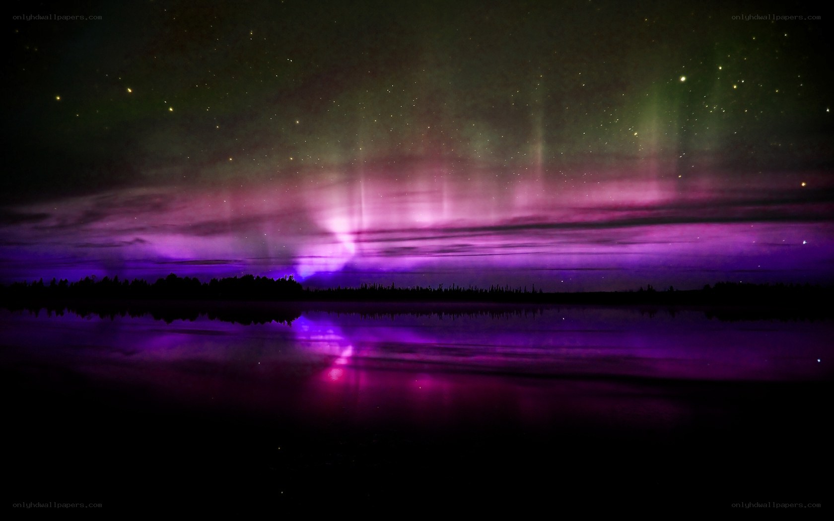 Aurora over a calm lake