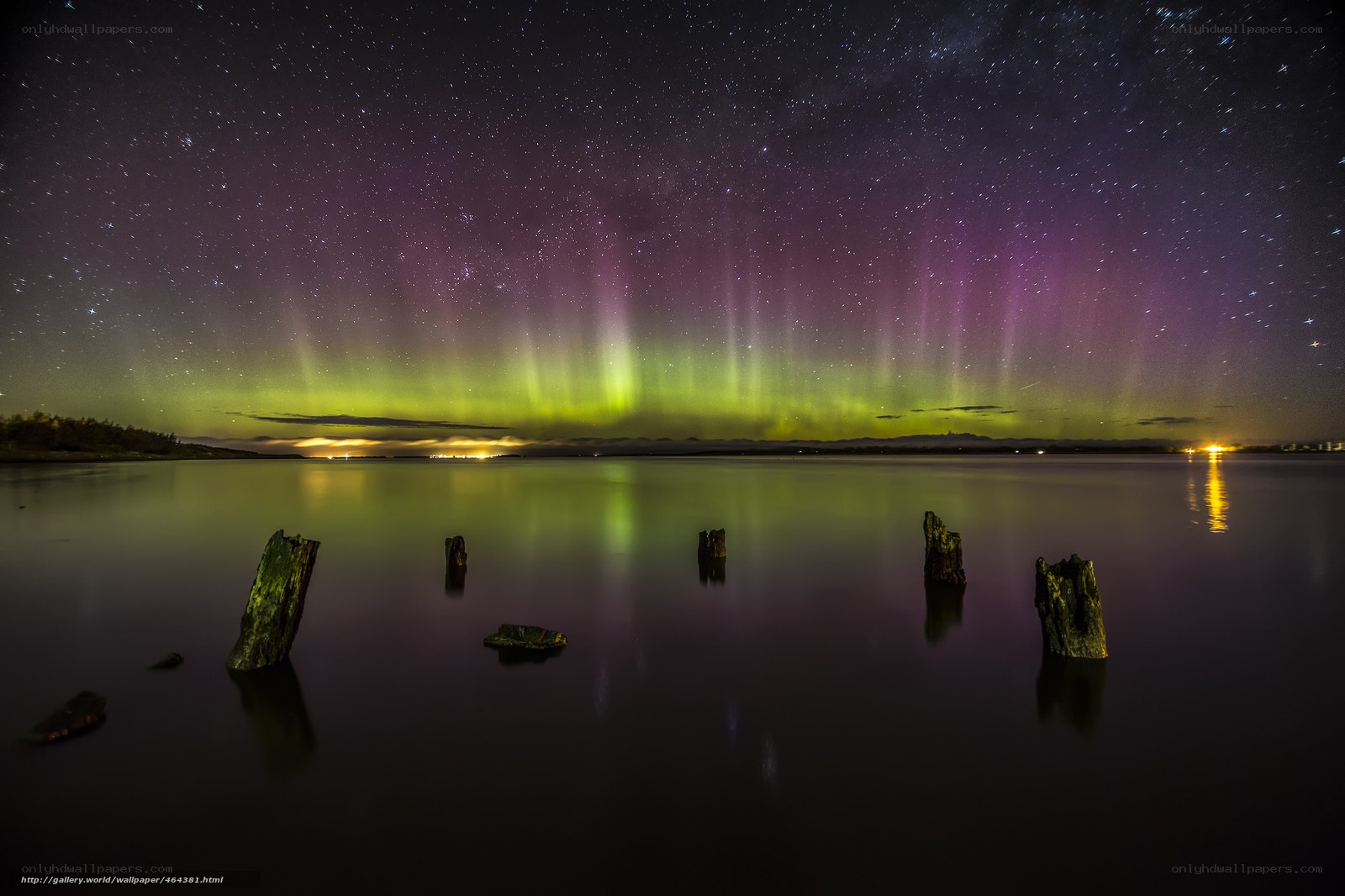 Aurora over a calm lake