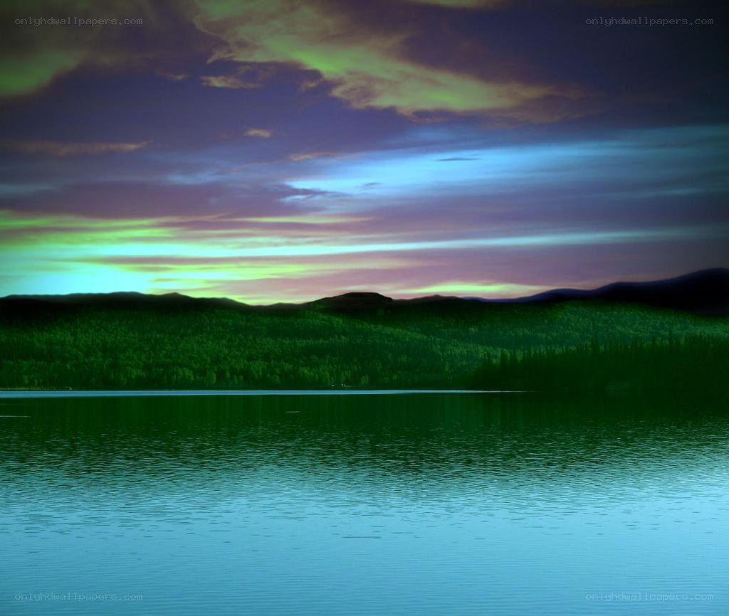 Aurora over a forest lake
